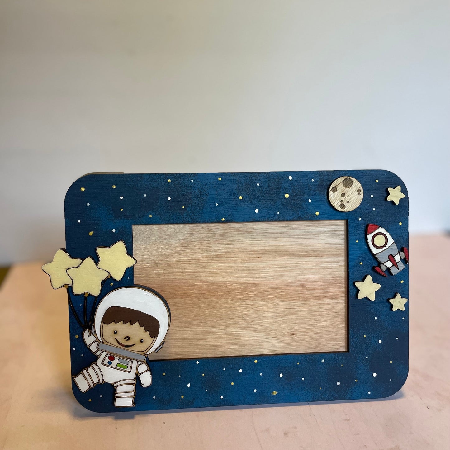Porta retrato de astronauta